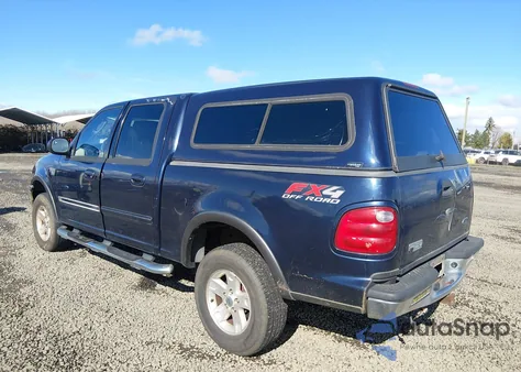 2002 Ford F-150 Lariat/Xlt z USA, uszkodzony, nr VIN 1FTRW08L32KC55365